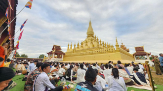 President Thongloun Leads Almsgiving Ceremony at That Luang Festival